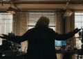 A hooded figure breaks into Peter Parker's apartment in Spider-Man Brand New Day