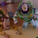 Woody, Buzz, and toys discover a tablet in their home